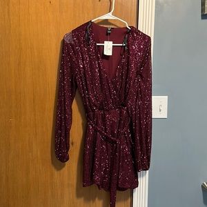 Brand new , didn’t fit me . Dark burgundy SIZE M ! It’s beautiful!